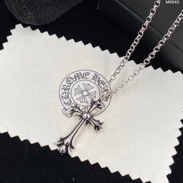 Gothic-inspired Chrome Hearts cross charm necklace, edgy streetwear jewelry for men and women.