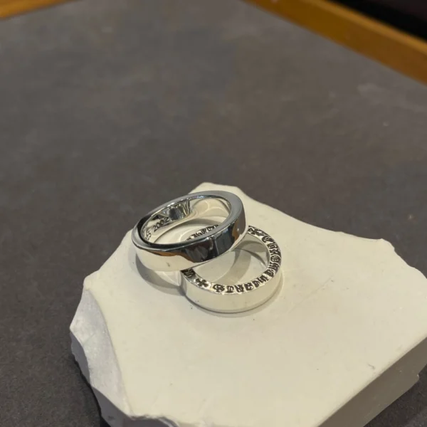 Chrome Hearts 6MM spacer ring in sterling silver with engraved gothic lettering and polished finish.