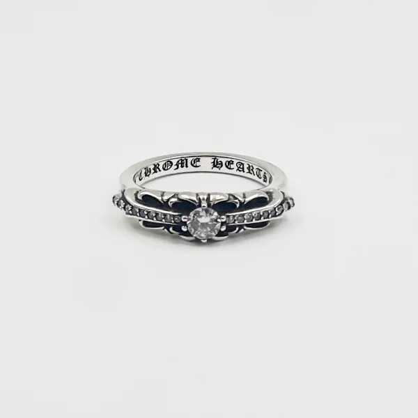 Chrome Hearts Baby Floral ring in sterling silver with pavé-set black diamonds and intricate floral design.