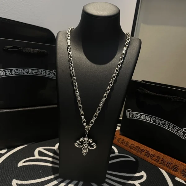 Sterling silver Chrome Hearts necklace featuring BS Fleur charm and detailed craftsmanship.