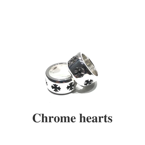 Chrome Hearts CH Plus thick band ring in sterling silver featuring bold plus motifs and chunky design.