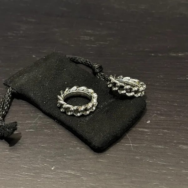 Sterling silver Chrome Hearts ring with chain-link pattern, handcrafted with signature edgy style.