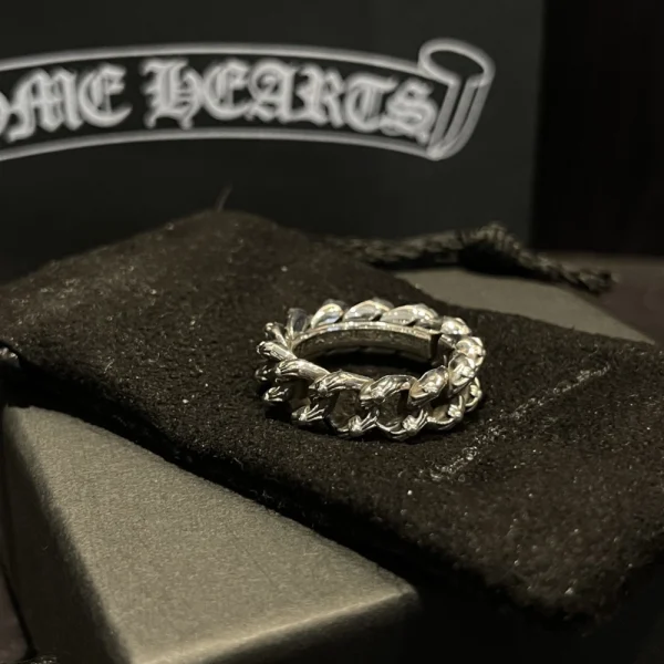 Chrome Hearts chain ring in sterling silver featuring interlocking gothic links and bold design.
