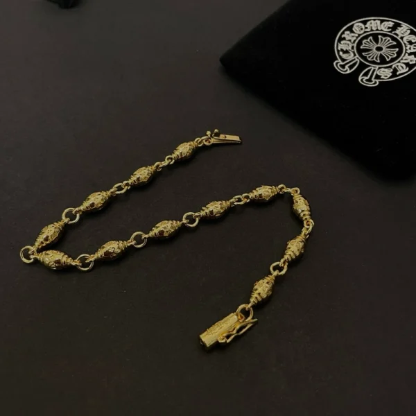 Close-up of Chrome Hearts chain necklace in sterling silver with classic gothic-style cross pendant.