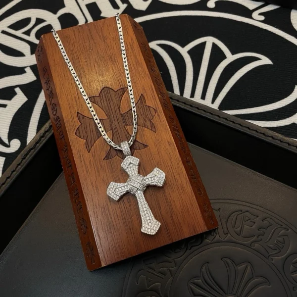 Chrome Hearts cross pendant necklace in sterling silver with bold gothic detailing.