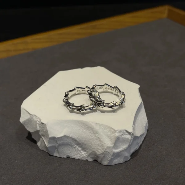 Edgy Chrome Hearts Cross Tail ring, iconic silver jewelry piece with signature gothic craftsmanship.