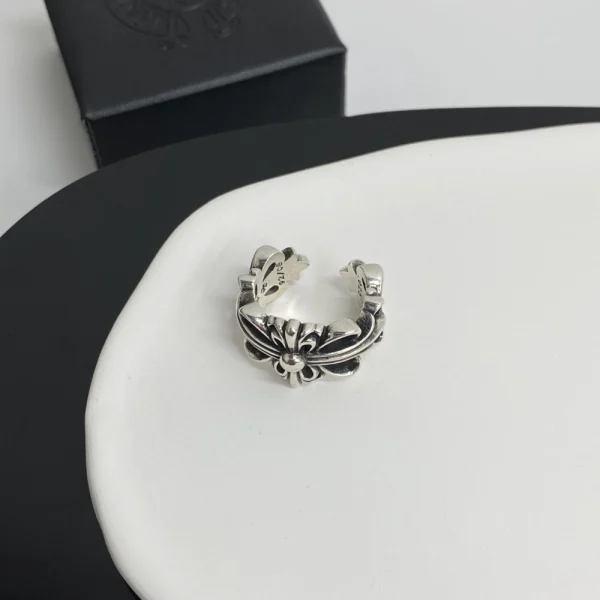 Sterling silver Chrome Hearts ring with double floral design, handcrafted luxury streetwear jewelry.