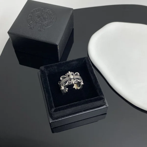 Chrome Hearts Double Floral ring in sterling silver featuring detailed floral gothic motifs.