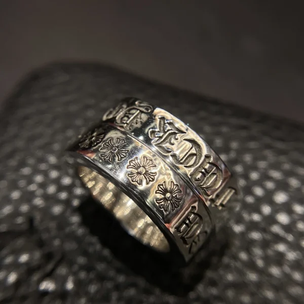 Iconic Chrome Hearts ring with bold engraved lettering, combining streetwear attitude with premium craftsmanship.