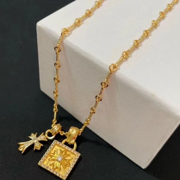 Elegant Chrome Hearts gold necklace with handcrafted details and premium streetwear style.