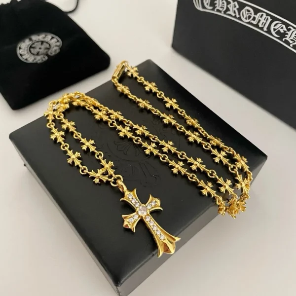 Elegant Chrome Hearts gold pendant necklace featuring sparkling diamonds and premium craftsmanship.