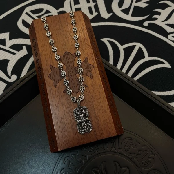 Luxury Chrome Hearts necklaces for men and women, detailed with bold pendants and silver chains.