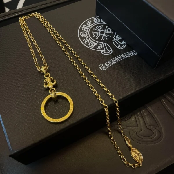 Chrome Hearts necklace with silver chain and gothic-style cross pendant, luxury streetwear jewelry.