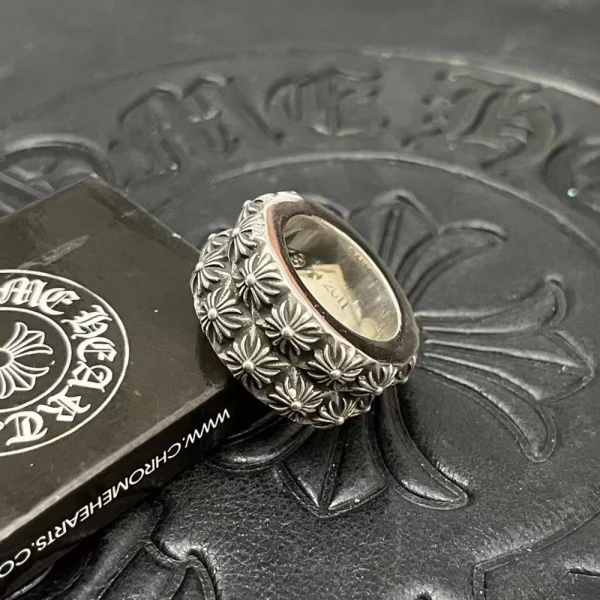 Chrome Hearts Pete Punk double ring in sterling silver featuring bold linked-band design and punk-inspired detailing.