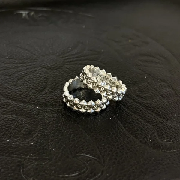 Chrome Hearts Plus Ragged Edge ring in sterling silver with bold gothic cross detailing.