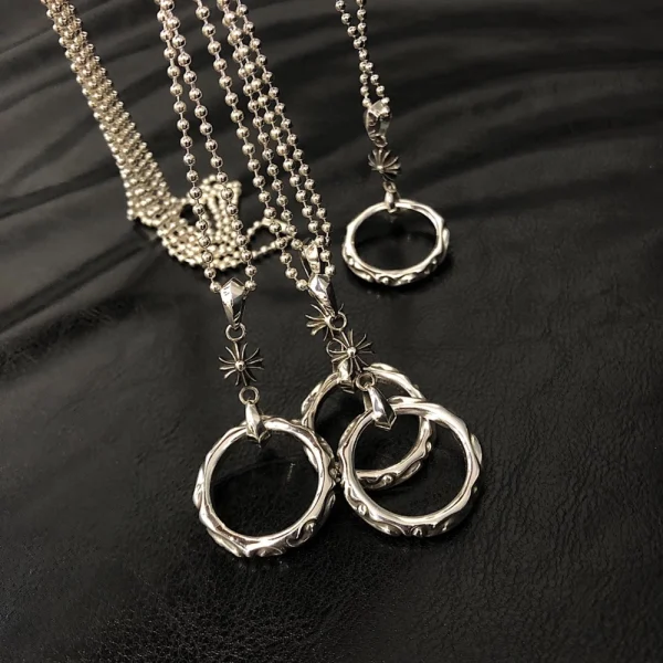 Sterling silver Chrome Hearts necklace with ring pendant, combining edgy style with luxury streetwear.
