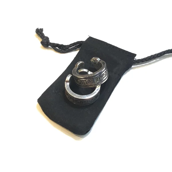 Sterling silver Chrome Hearts ring with scroll label design, handcrafted with bold streetwear aesthetics.