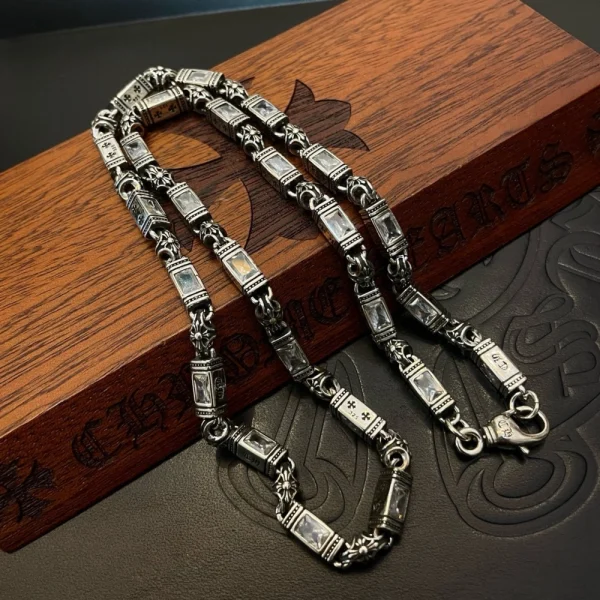 Chrome Hearts silver necklace featuring bold chain links and iconic gothic-inspired design.