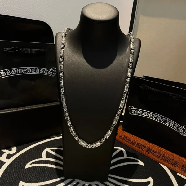Sterling silver Chrome Hearts necklace with handcrafted details and luxury streetwear appeal.