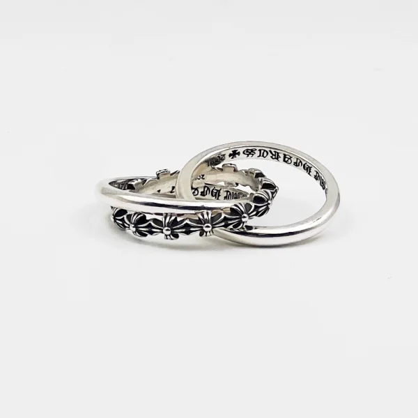 Sterling silver Chrome Hearts ring with iconic motifs and luxury streetwear appeal.