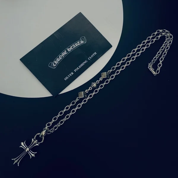 Handcrafted Chrome Hearts small cross with bail necklace, iconic minimalist design for everyday wear.