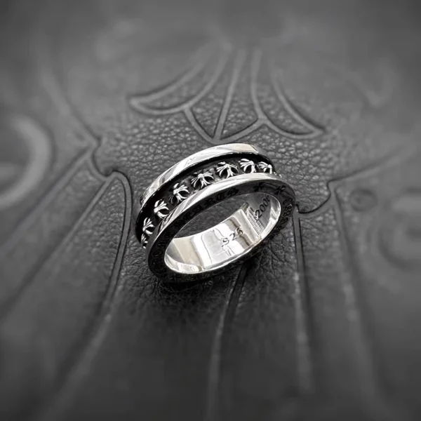 Sterling silver Chrome Hearts spinner ring featuring small CH Plus design and detailed handcrafted finish.