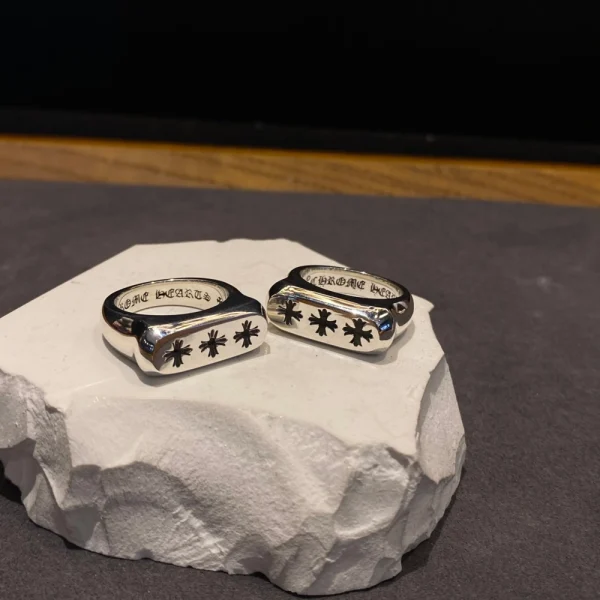 Chrome Hearts Triple CH Plus flat ring in sterling silver with bold gothic cross motifs.