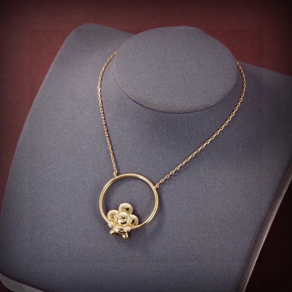 Gold Vivienne Swing Necklace replica – Playful and elegant Louis Vuitton-inspired gold necklace by GodJewel