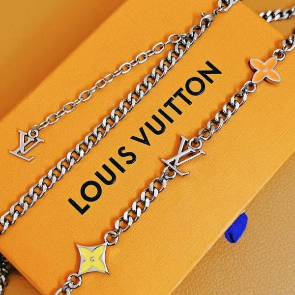 Monogram Row Necklace Orange replica – Vibrant Louis Vuitton-inspired necklace with signature monogram in orange by GodJewel