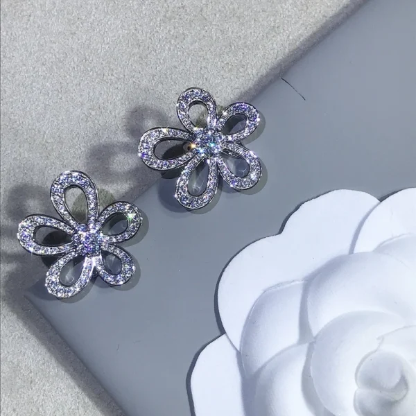 Van Cleef & Arpels Flowerlace earrings – Sophisticated lace-style luxury earrings available at GodJewel