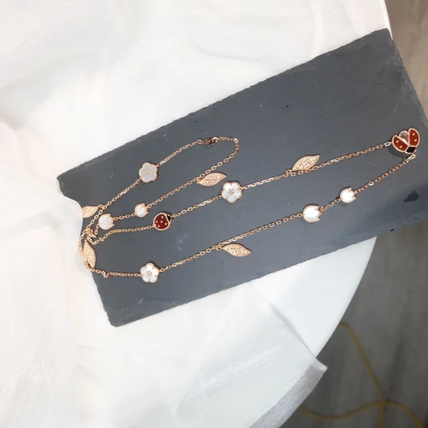 Lucky Spring long necklace – Playful nature-inspired luxury jewelry by Van Cleef, available at GodJewel