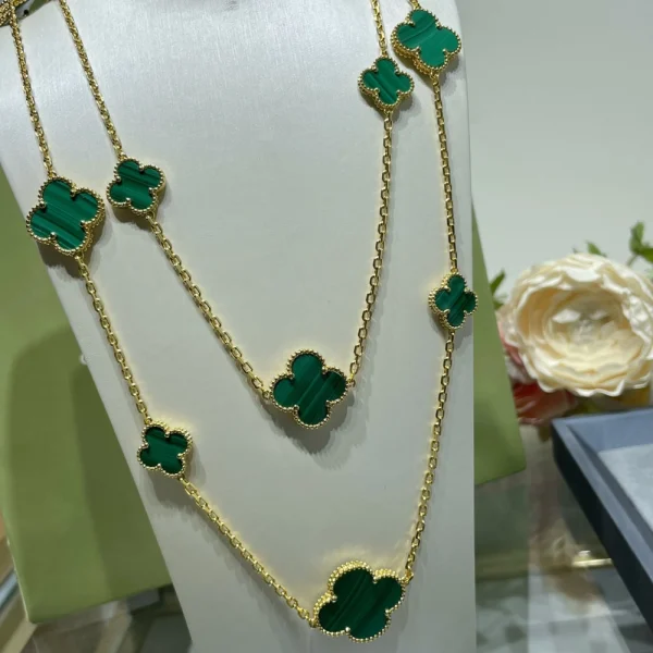 Van Cleef & Arpels Magic Alhambra long necklace 16 motifs – Elegant mixed-size clover luxury jewelry by GodJewel
