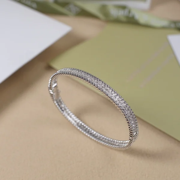 Perlée diamonds bracelet in white gold – Sparkling beaded-edge luxury jewelry by Van Cleef, at GodJewel