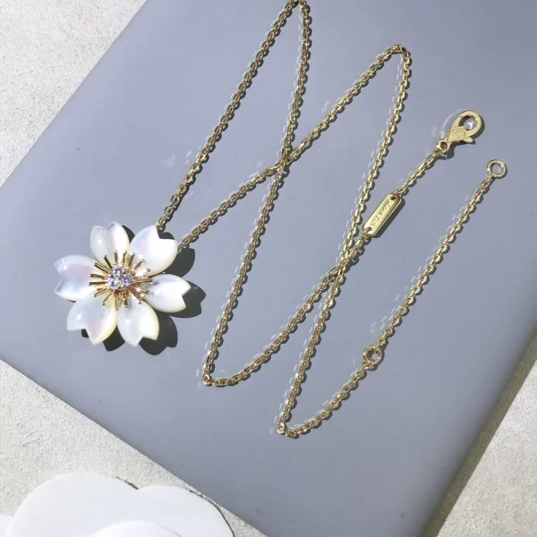 Van Cleef Rose de Noël clip pendant necklace | GodJewel