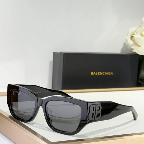 Balenciaga cat-eye sunglasses with sharp frame design and logo on temples