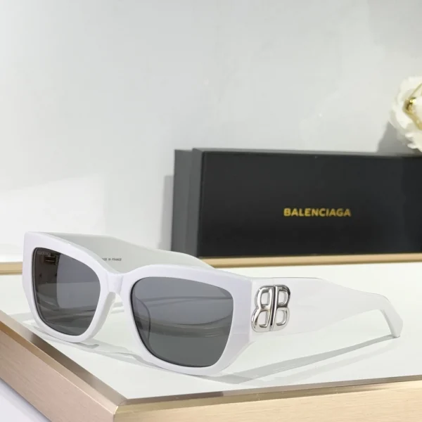 Luxury Balenciaga Eyewear cat-eye sunglasses featuring sculpted silhouette and glossy finish
