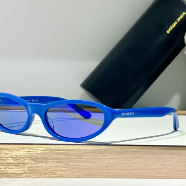 Balenciaga Neo round sunglasses with circular lenses and bold logo detailing on the temples
