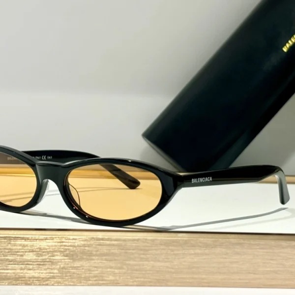 Luxury Balenciaga Neo sunglasses featuring rounded silhouette and high-shine finish