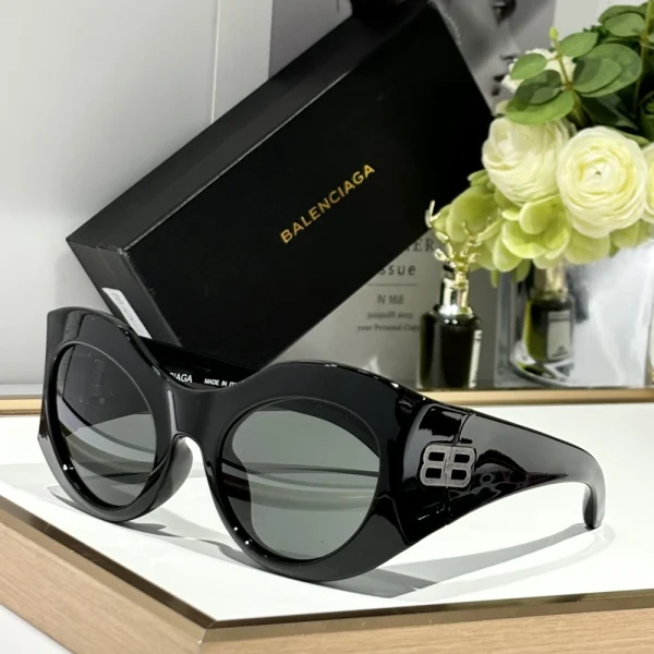 Balenciaga round sunglasses with full-rim circular lenses and subtle logo on temples