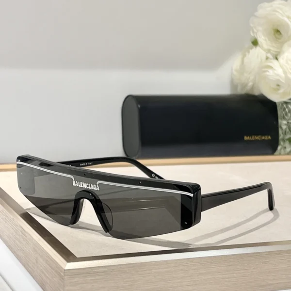 Make a futuristic statement with Balenciaga Ski rectangle sunglasses – sleek, bold, and directional
