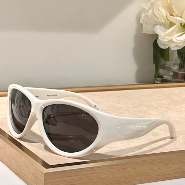Balenciaga Swift oval sunglasses with slim frame and subtle logo on the temples