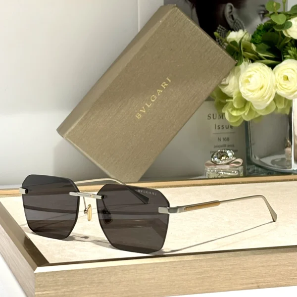 Close-up of Bvlgari Octo Finissimo sunglasses with matte black finish and sharp angles