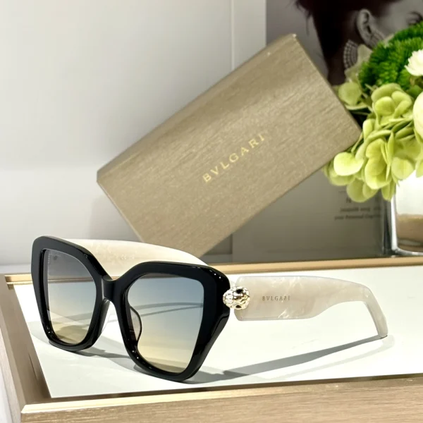 Statement Bvlgari sunglasses from the Serpenti collection, blending seductive curves and precious metal accents