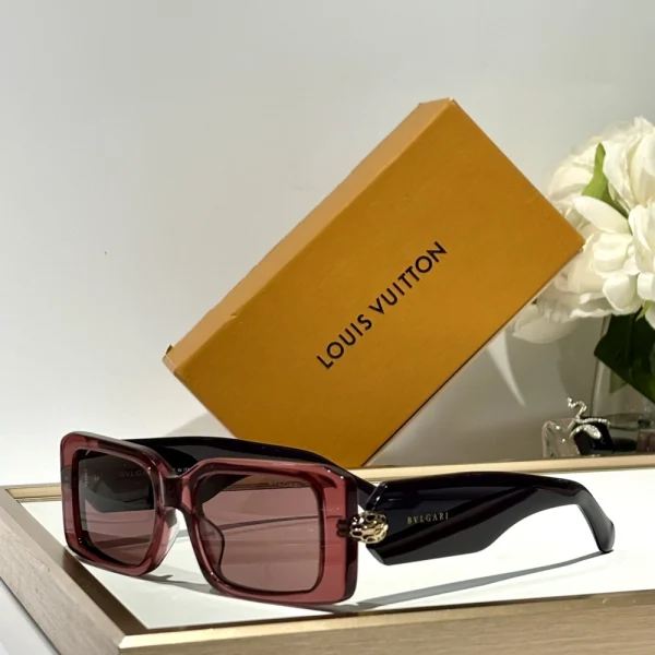 Luxurious Bvlgari Serpenti sunglasses placed on a white tabletop, showcasing craftsmanship and premium materials