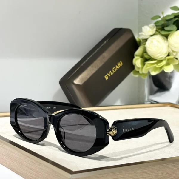 Bvlgari Serpenti sunglasses featuring signature snake-scale temple detail and luxury gradient lenses