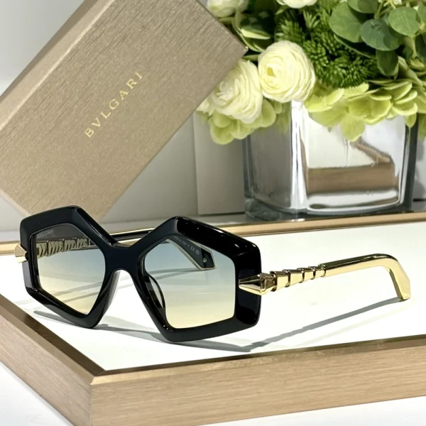 Luxurious Bvlgari Serpenti sunglasses displayed next to branded box and microfiber cloth
