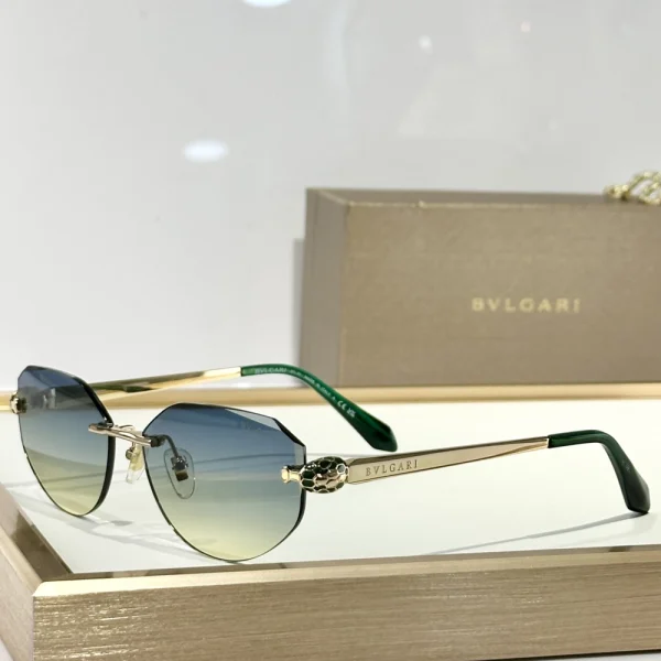 Bvlgari Serpenti sunglasses placed on a glossy white surface, with temples coiled in iconic snake-scale pattern