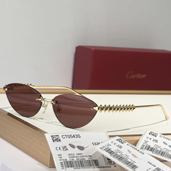 Cartier sunglasses with distinctive Clash collection design—metal studs and refined curves in harmony