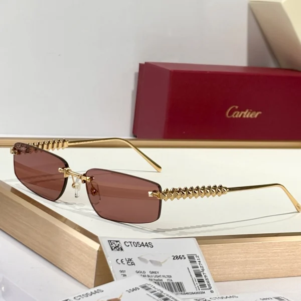 Luxury Cartier Clash de Cartier sunglasses resting beside red Cartier case, blending edge and elegance