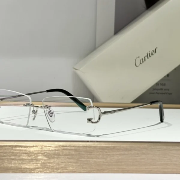 Cartier Décor C classique de Cartier sunglasses lying flat on beige velvet surface, showcasing timeless silhouette and premium finish